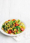 Zucchini noodle salad with herbs, cashews and chilli dressing
