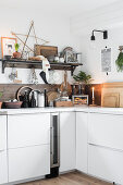 Festive vintage-style decorations in wood-clad kitchen