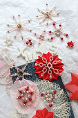 Romantic Christmas arrangement of bead and paper stars and snowflakes