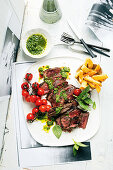 Onglet steak with salsa verde and parmesan chips