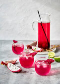 Refreshing tropical dragon fruit shrub drink with lime and thyme