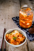 Kimchi in a jar and in a bowl