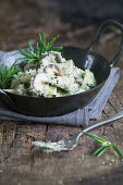 Tagliatelle with porcini mushrooms in spinach cream sauce with parmesan