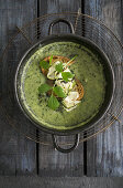 Courgette and potato soup with lovage and grilled bread