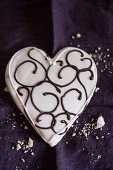 A heart-shaped biscuit with icing