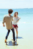 A young couple on a beach