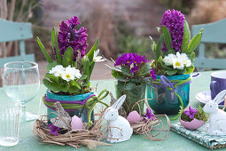 Table decoration with hyacinths and primroses