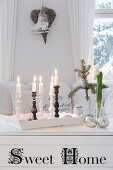 Christmas decorations on white wooden trunk used as coffee table