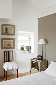 Vintage-style attic bedroom in natural shades