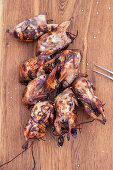 Grilled quails in bourbon berry brine