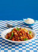 Penne with bolognese sauce and basil