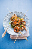 Grilled Caribbean prawn skewers with coriander dressing