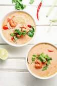 Traditional thai soup tom yum with shrimps and mushrooms