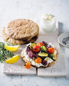 Mediterranean vegetable open pitas with lemon ricotta