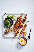 Cayenne chicken skewers with black bean salsa