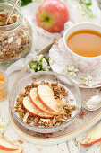 Apple Granola with Milk Apple Slices and a Cup of Tea