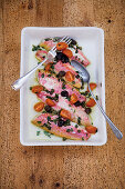 Red mullet fillets à la livourne with cherry tomatoes, dried black olives and capers
