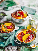Baked ricotta puddings with orange and date salad
