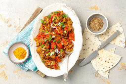 Indian style aubergine with tomatoes