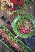 Marinated beef with beetroot pasta