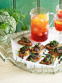 Pan-fried chicken livers and capers on crostini