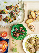 Bocconicini balls with dukkah, devils on horseback, pan-fried chicken livers and capers on crostini