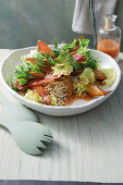 Chicory salad with roasted pear wedges, beansprouts, ham and a rosehip dressing