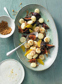 Roasted fig salad with candied ginger and oranges with sweet quark gnocchi