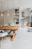 Wooden table and classic chairs in dining area