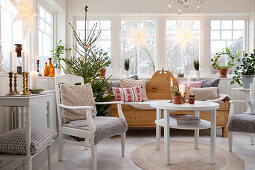 Christmas tree in Scandinavian-style conservatory