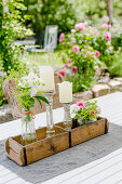 Table Decoration With Candles And Little Bouquets