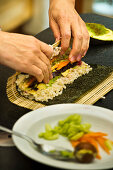 Vegan nori maki being made