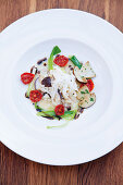 Porcini mushroom risotto with oven roasted tomatoes and brown butter vinaigrette