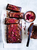 Chocolate and buttermilk slab cake with freezed raspberries