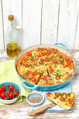 Potato tortilla with courgette and cherry tomatoes