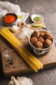 Ingredients for spaghetti with meatballs and tomato sauce