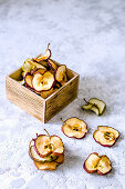 Dried apple chips in a wooden box