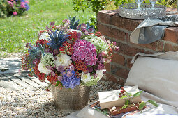 Bouquet of hydrangea, dahlias, yarrow, umbel, man litter, cartilage