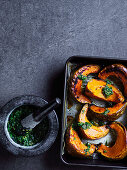 Roasted pumpkin with zhoug (hot green sauce)