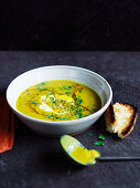 Red lentil soup with yoghurt and coriander