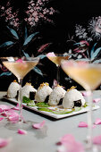 Onigiri (rice balls with salmon, Japan) served with cocktails