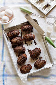 Chocolate madeleines with chocolate glaze