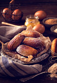 Homemade madeleines with some ingredients