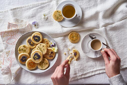 Tea with flower biscuits