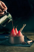 Poached pears in red wine with cinnamon and spices