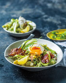 Green saparagus and ricotta penne with poached egg, ricotta and bacon