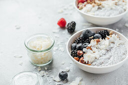Chia pudding with coconut milk, berries and nuts