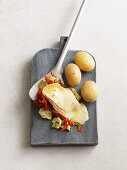 Artichoke and pepper raclette with taleggio