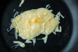 Melted alpine cheese