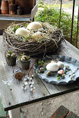 Wreath Of Branches As Easter Basket With Eggs
